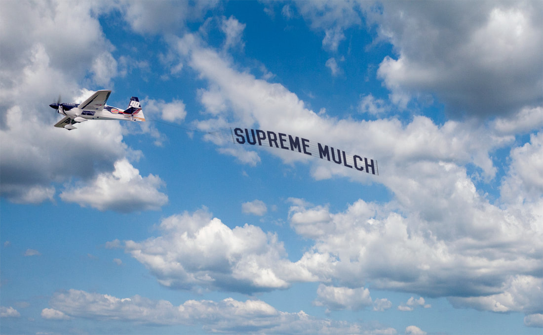 Supreme Mulch Airplane Banner